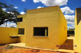 Lote com 165,00m² compreendendo uma casa, localizado em Curvelo - MG